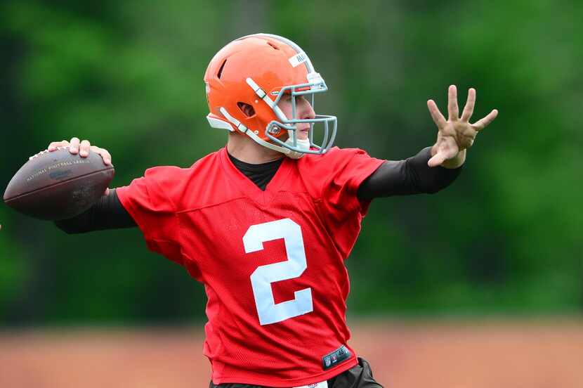 May 28, 2014; Berea, OH, USA; Cleveland Browns quarterback Johnny Manziel (2) throws a pass...