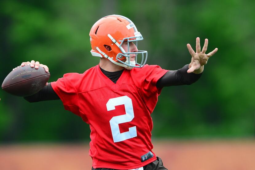 May 28, 2014; Berea, OH, USA; Cleveland Browns quarterback Johnny Manziel (2) throws a pass...