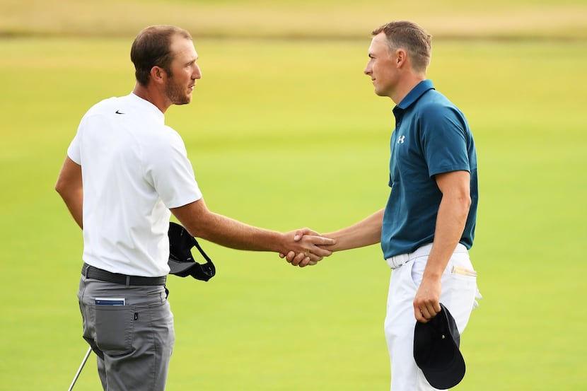 CARNOUSTIE, SCOTLAND - JULY 21:  Kevin Chappell of the United States (L) shakes hands with...