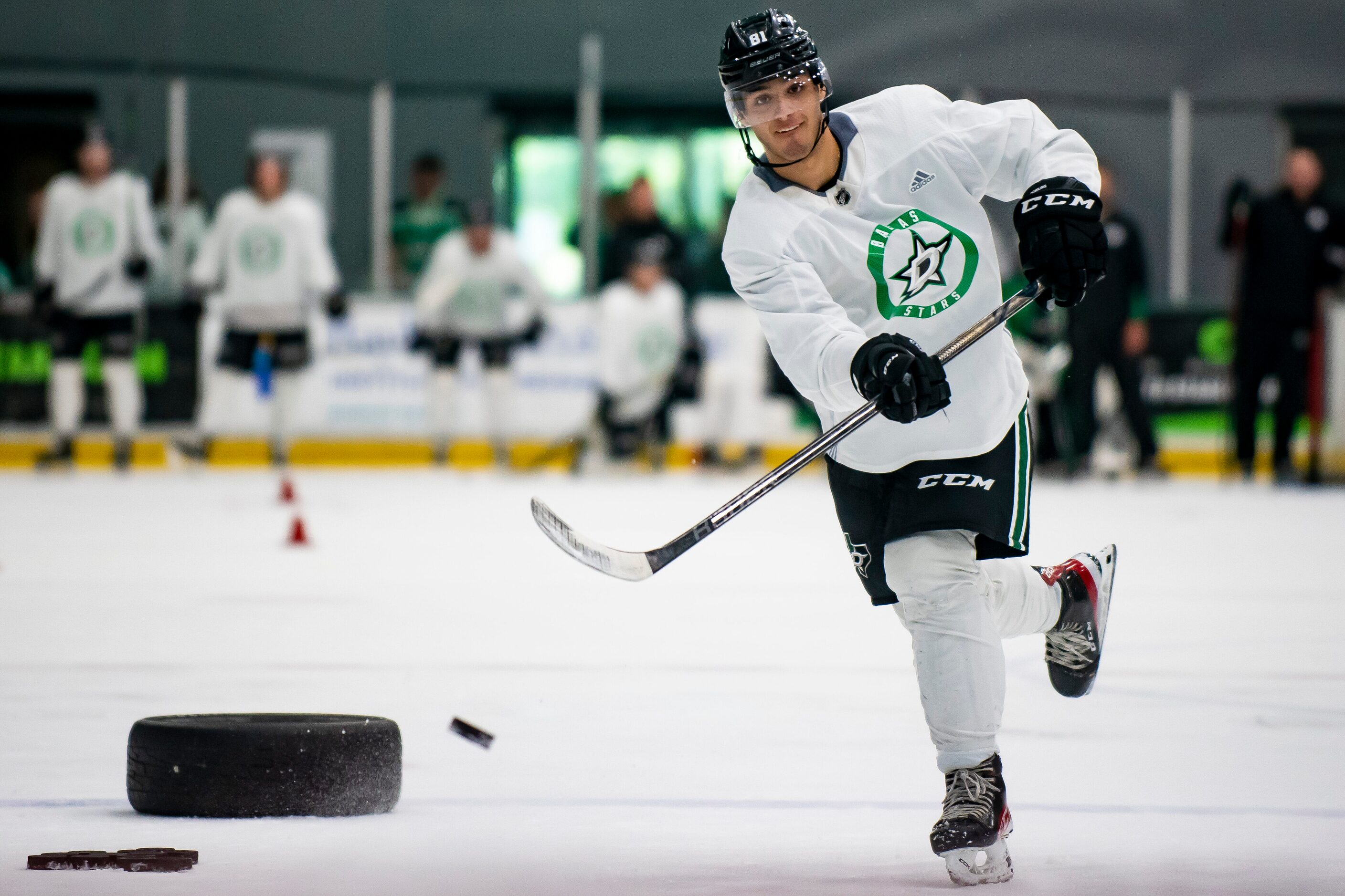 Defenseman George Fegaras (81) fires a shot at the goal while going through a drill during...