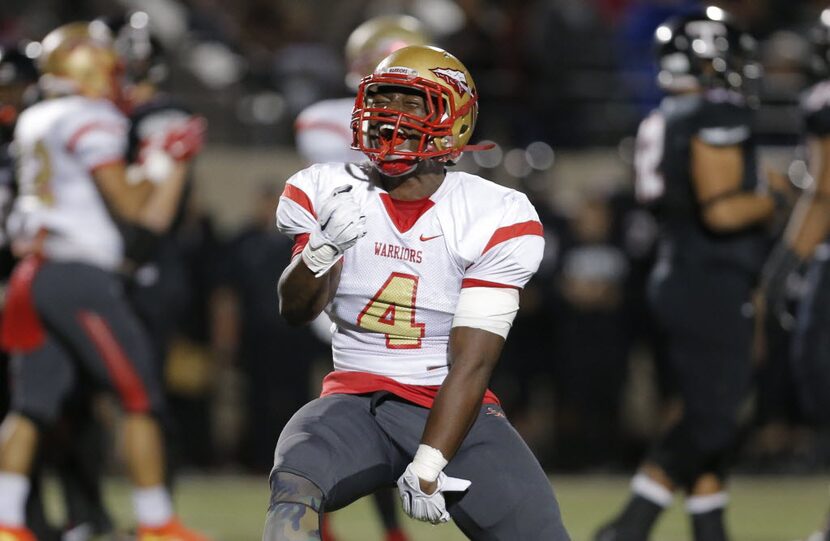 South Grand Prairie senior defensive back Chase Napoleon (4) celebrates a sack during the...