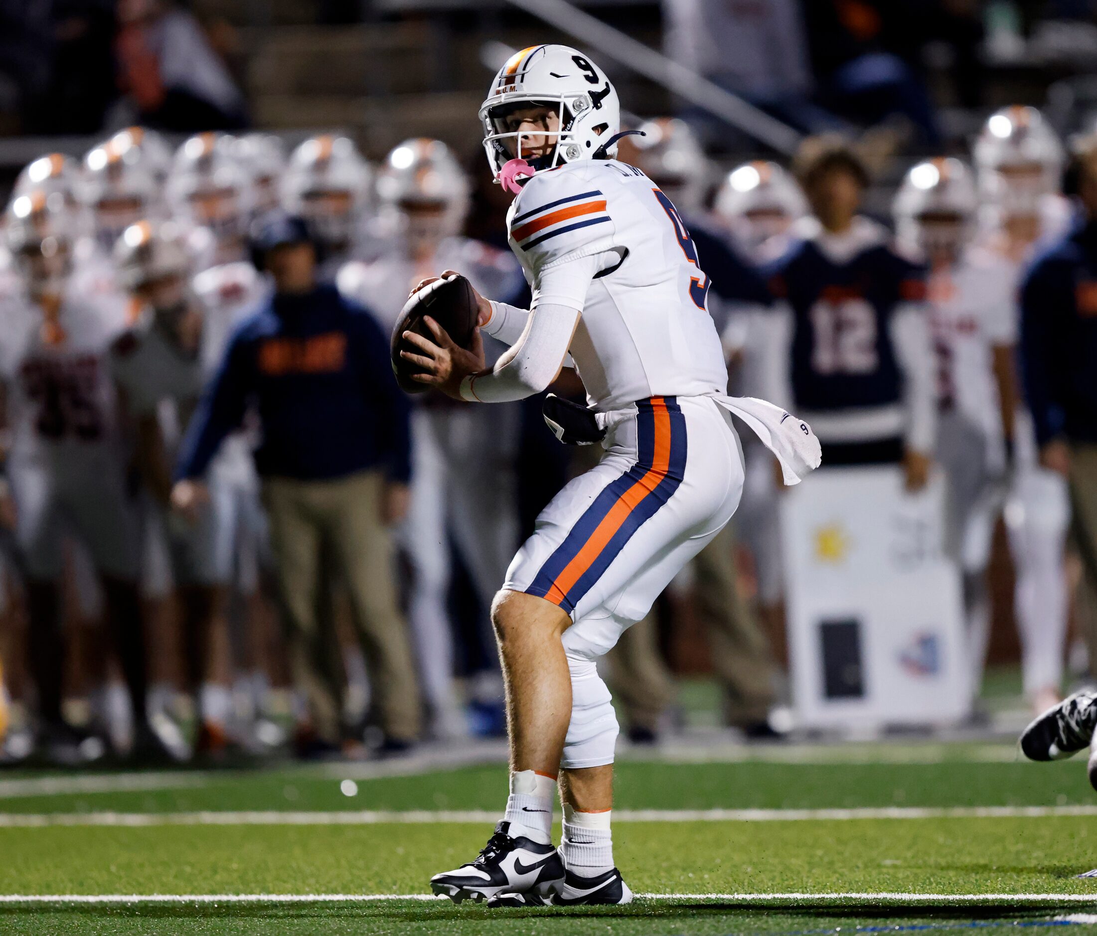 Frisco Wakeland quarterback Brennan Myer (9) looks to throw a second quarter touchdown pass...