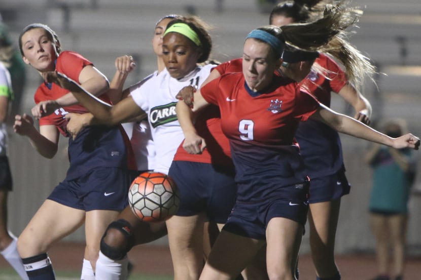 Southlake Carroll and Ally Griffin (11) had to fight past McKinney Boyd in overtime in their...