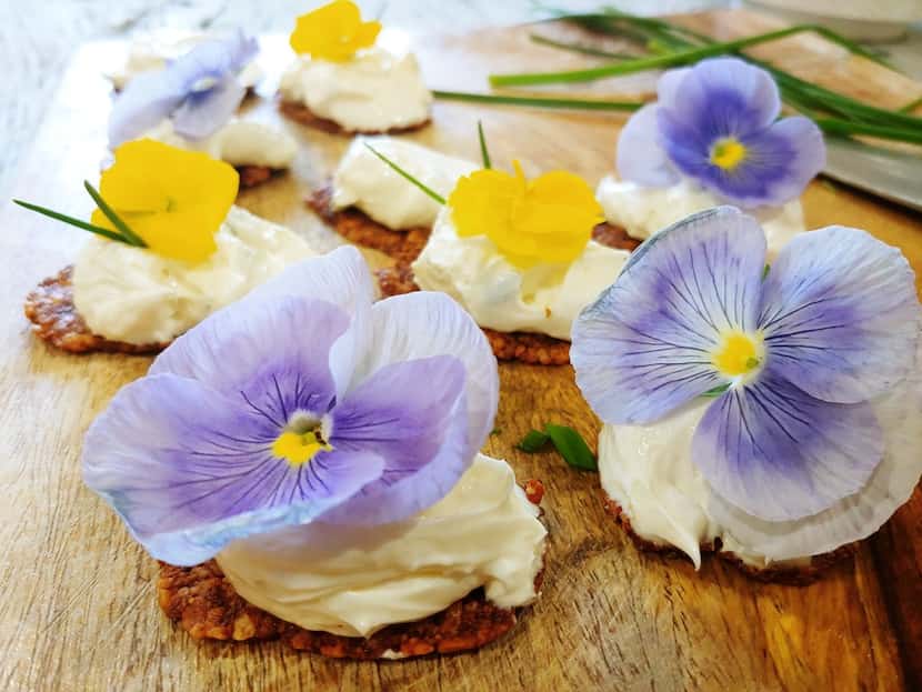 Pansies can be eaten raw in salads, or with cream cheese on hors d'oeuvres.