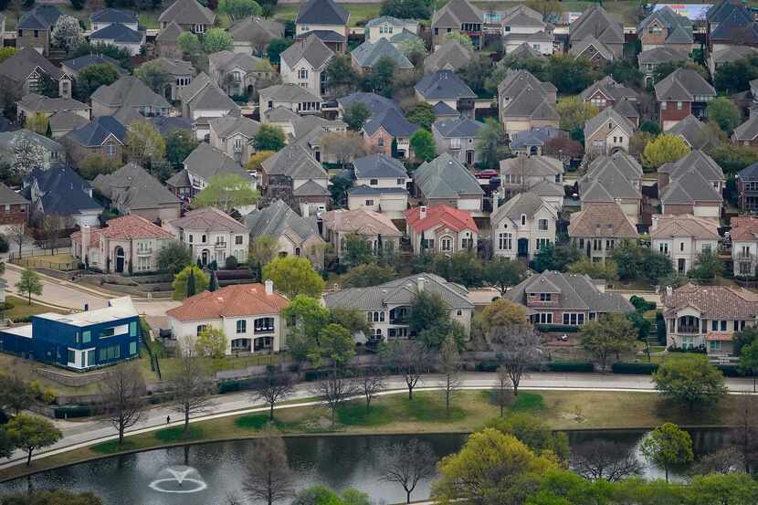Aerial view of residential subdivisions in Irving. According to a city survey, nearly three...