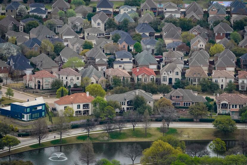 Aerial view of residential subdivisions near Las Colinas on Thursday, March 12, 2020, in...