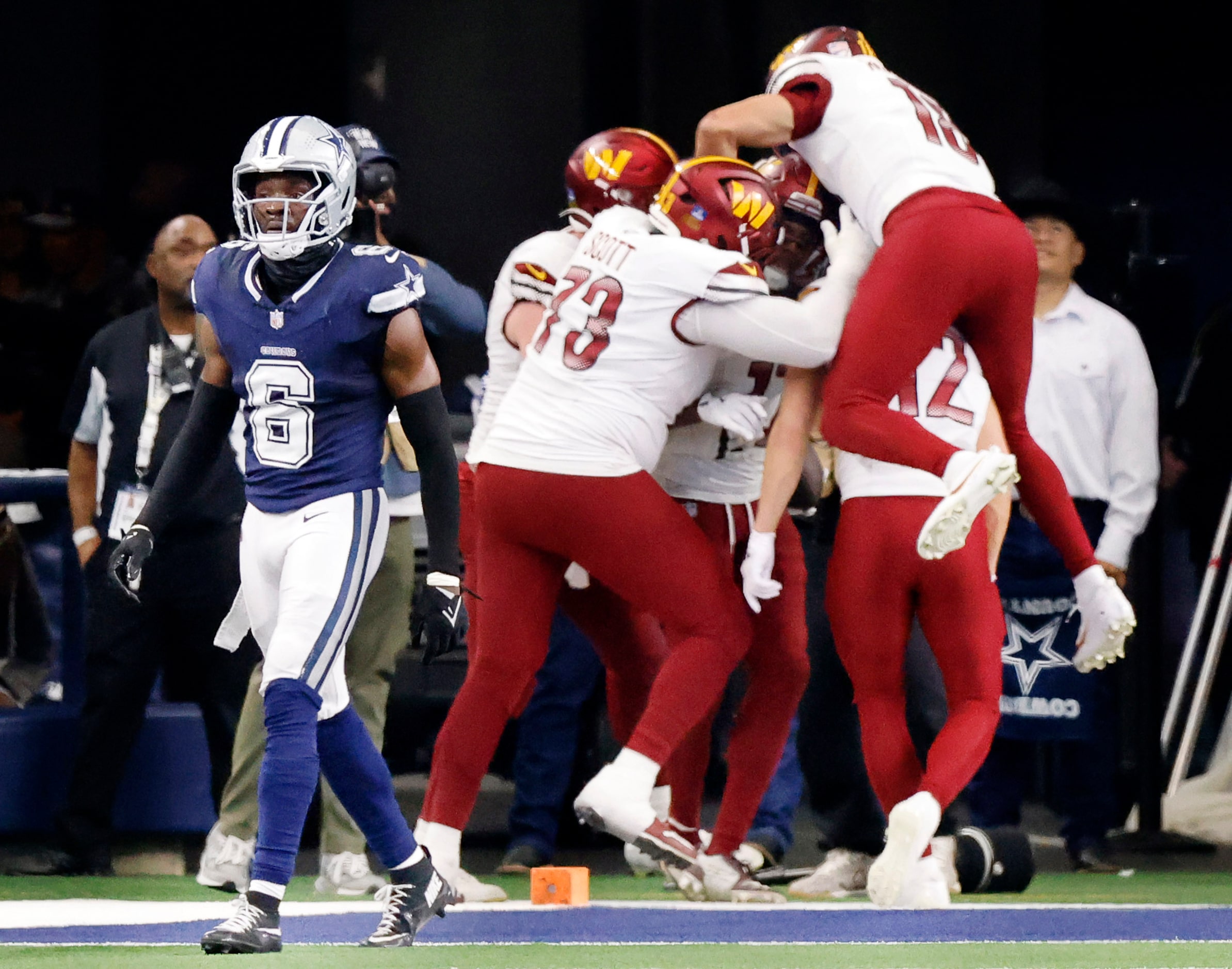 Dallas Cowboys safety Donovan Wilson (6) walks off the field as Washington Commanders...