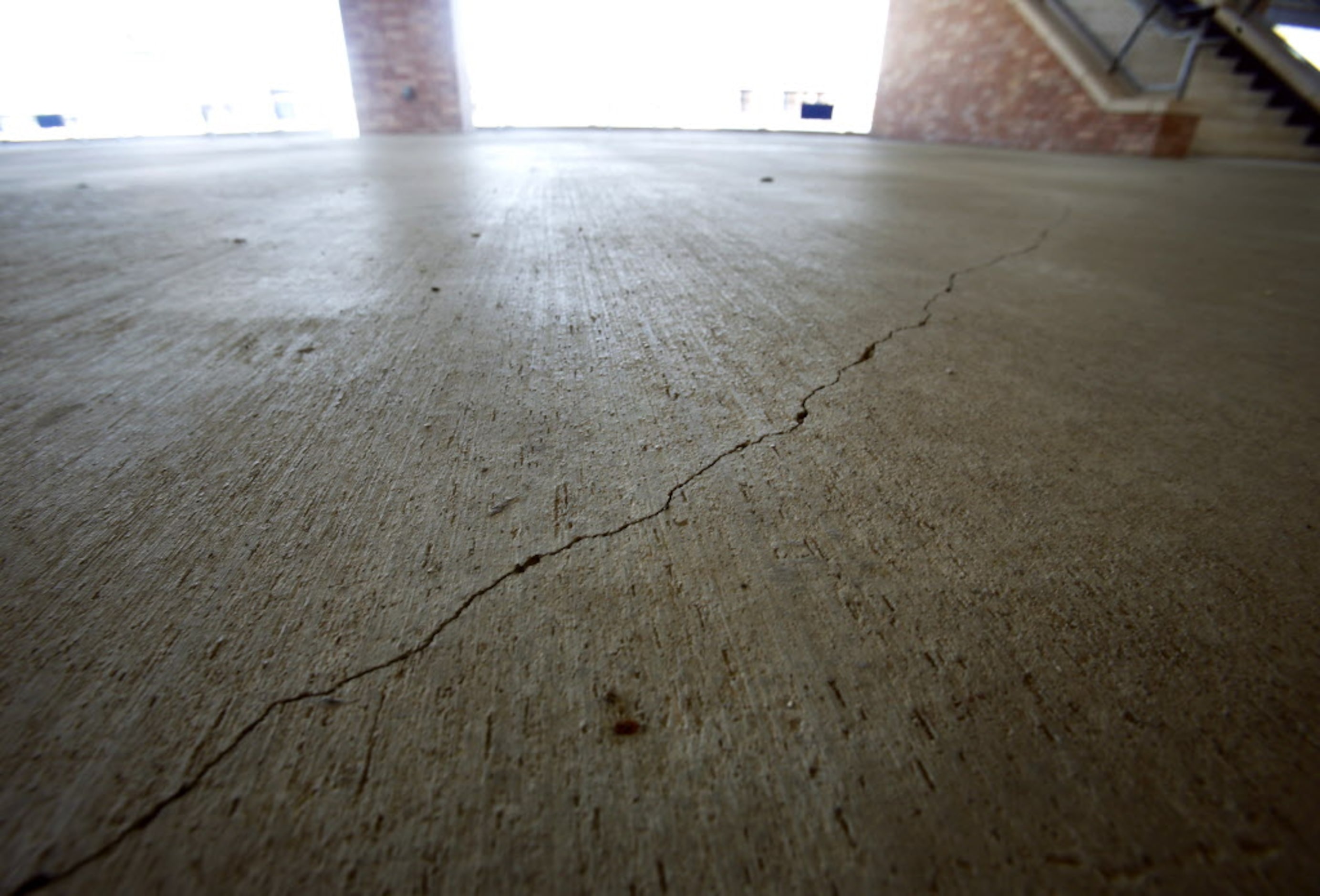 Some of the many cracks can be seen in this photo at Eagle Stadium in Allen, Texas on May...