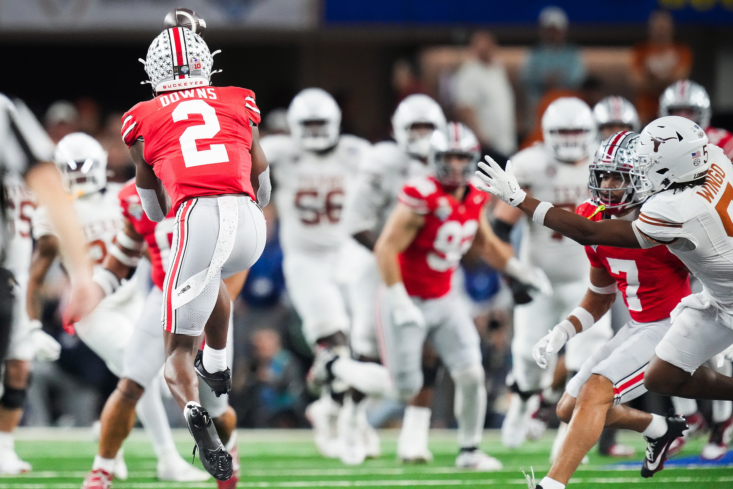 Ohio State safety Caleb Downs (2) intercepts a pass intended for Texas wide receiver Ryan...