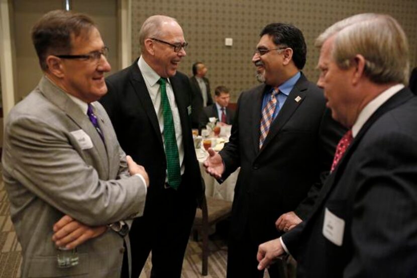 
From left: Ronald Brown of UNT-Dallas, Neal Smatresk of UNT, Vistasp Karbhari of UTA and...