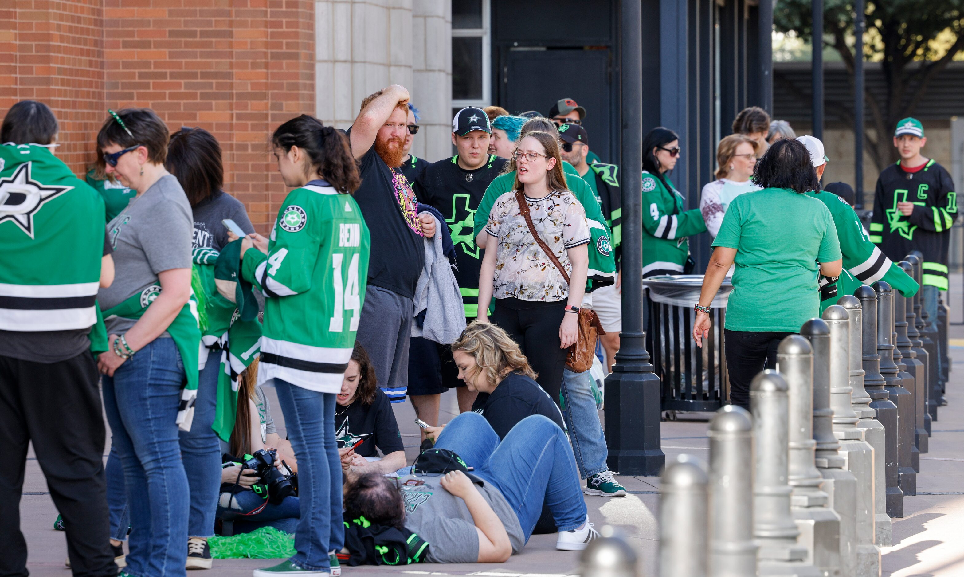 Dallas Stars fans wait in line to enter before the start of the Stars home opener against...