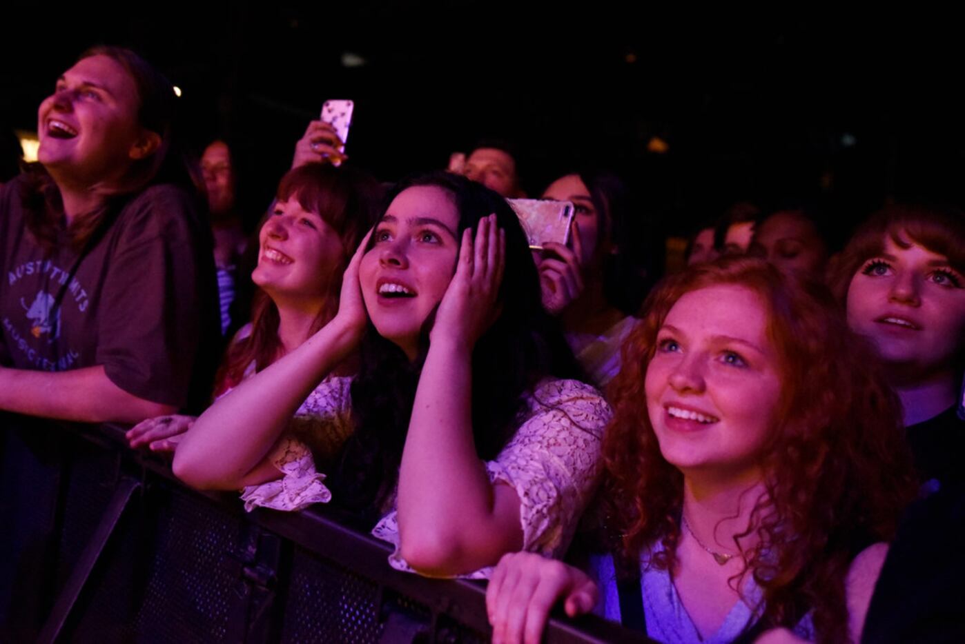 Fans react while watching singer-song writer Hozier perform at the Southside Ballroom in...