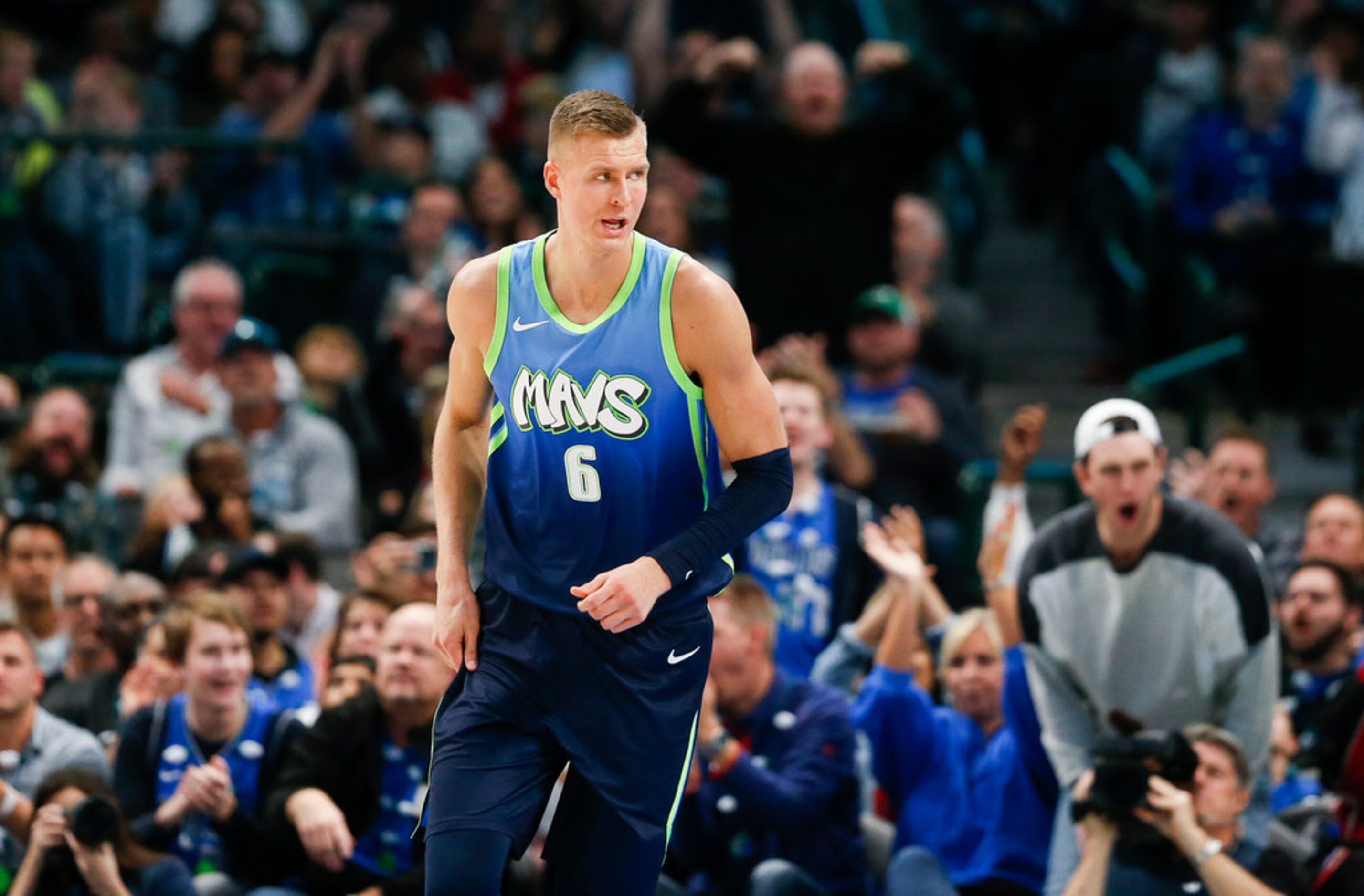 Dallas Mavericks forward Kristaps Porzingis (6) celebrates scoring during the second half of...