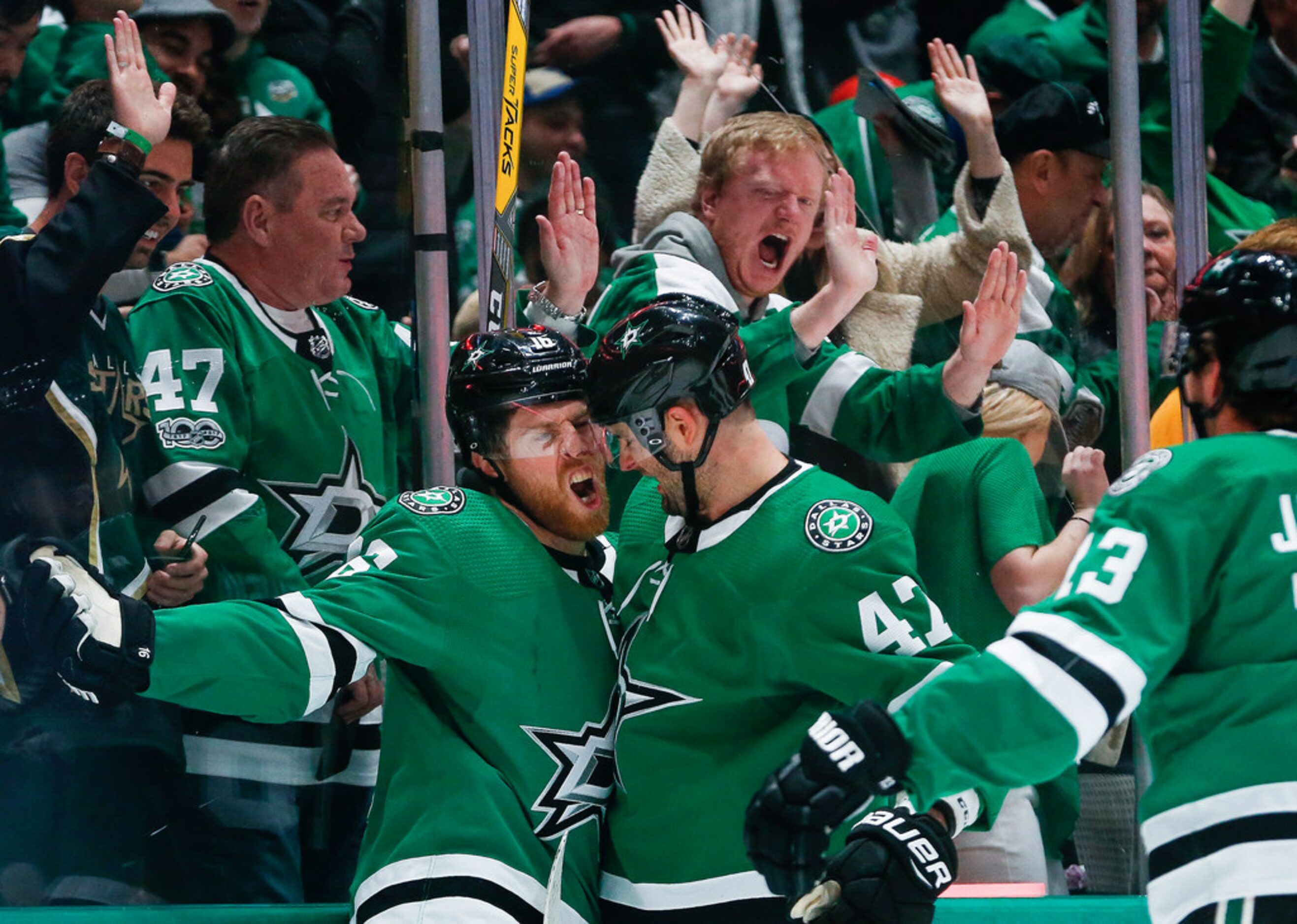 Dallas Stars center Joe Pavelski (16) celebrates his score with right wing Alexander Radulov...