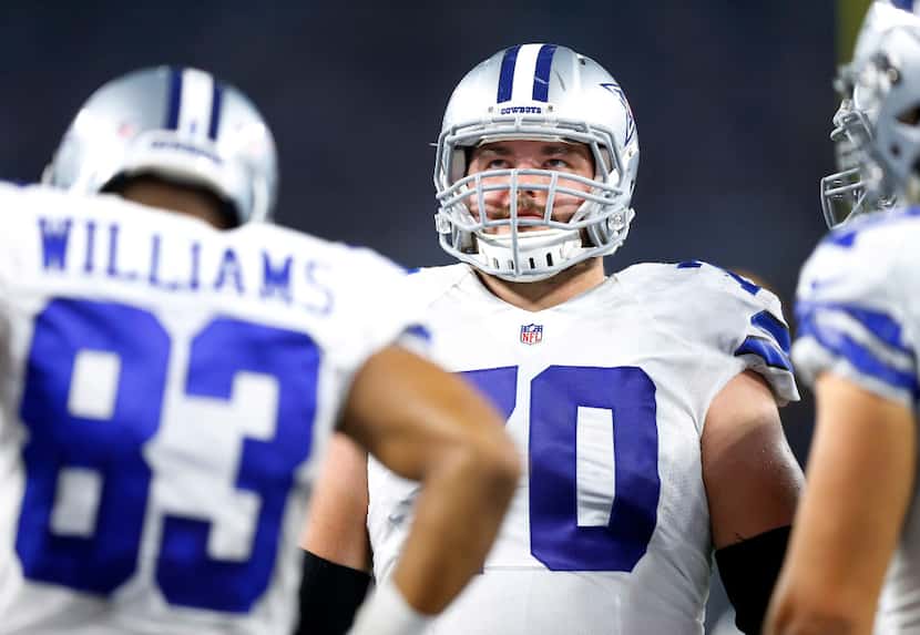 FILE - Cowboys guard Zack Martin (70) waits for play to resume during a second quarter...