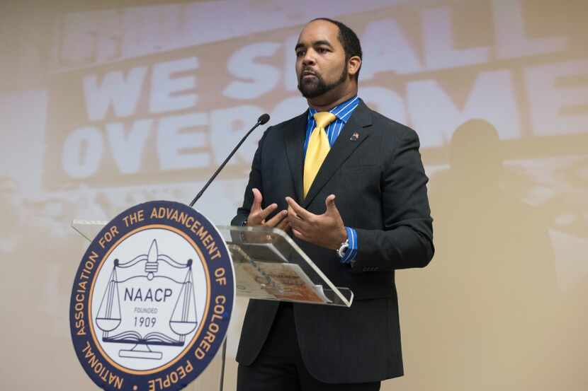 Dallas NAACP President Aubrey Hooper speaks to the audience after being sworn in sworn in at...