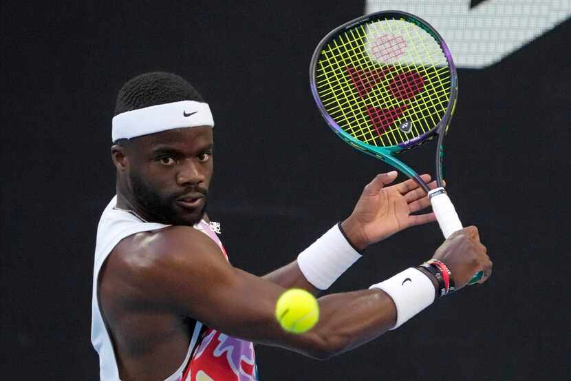 Frances Tiafoe of the U.S. plays a backhand return to Karen Khachanov of Russia during their...