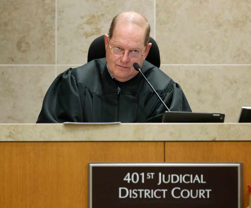 District Judge Mark Rusch addressed the court during the trial on Tuesday. (David Woo/Staff...
