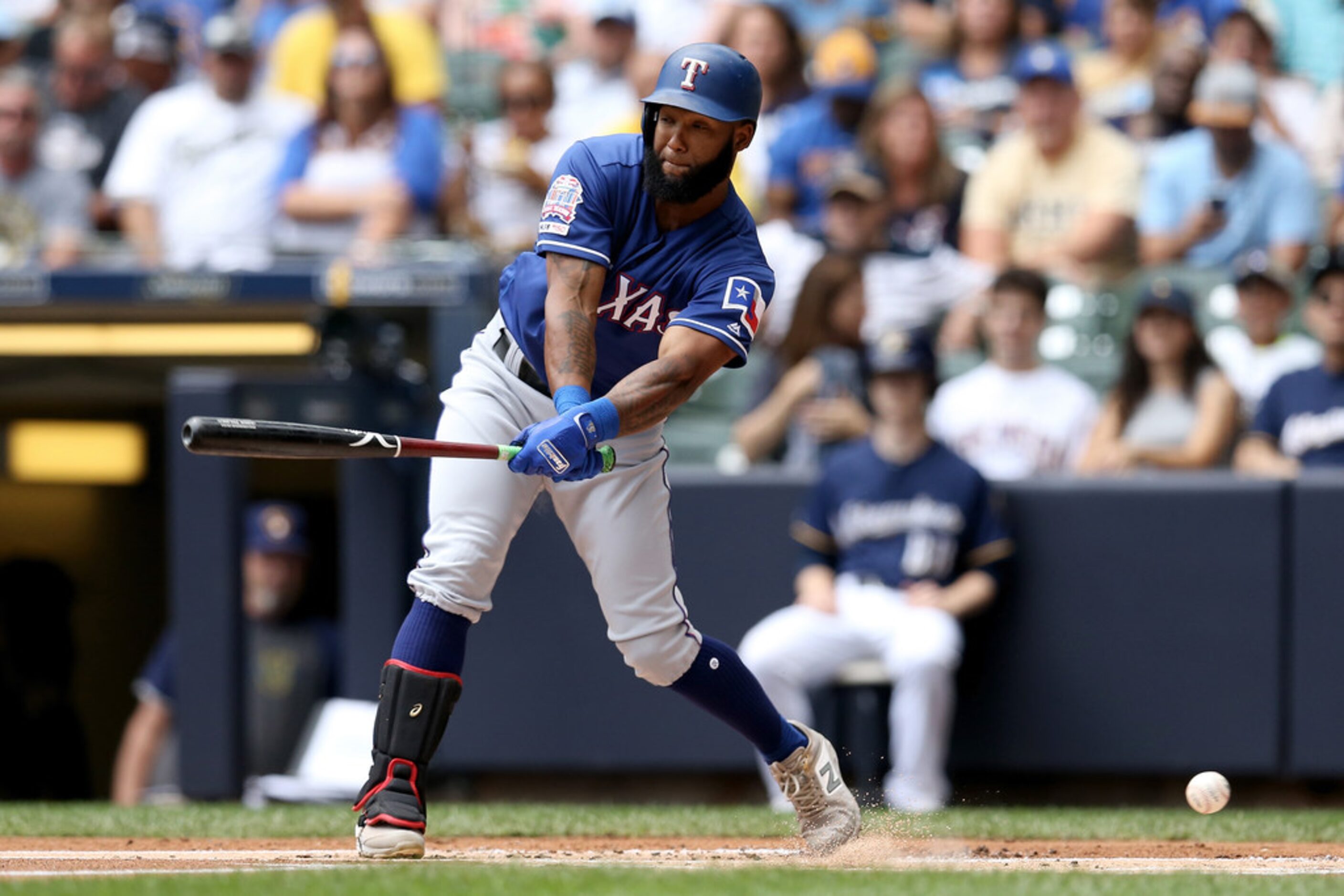 MILWAUKEE, WISCONSIN - AUGUST 11:  Danny Santana #38 of the Texas Rangers strikes out in the...