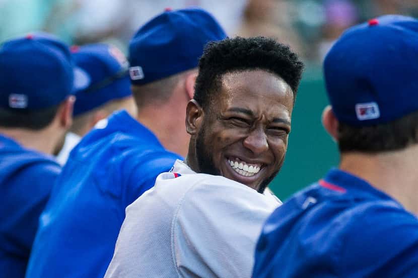 Round Rock Express shortstop Jurickson Profar laughs while conversing in the dugout during...