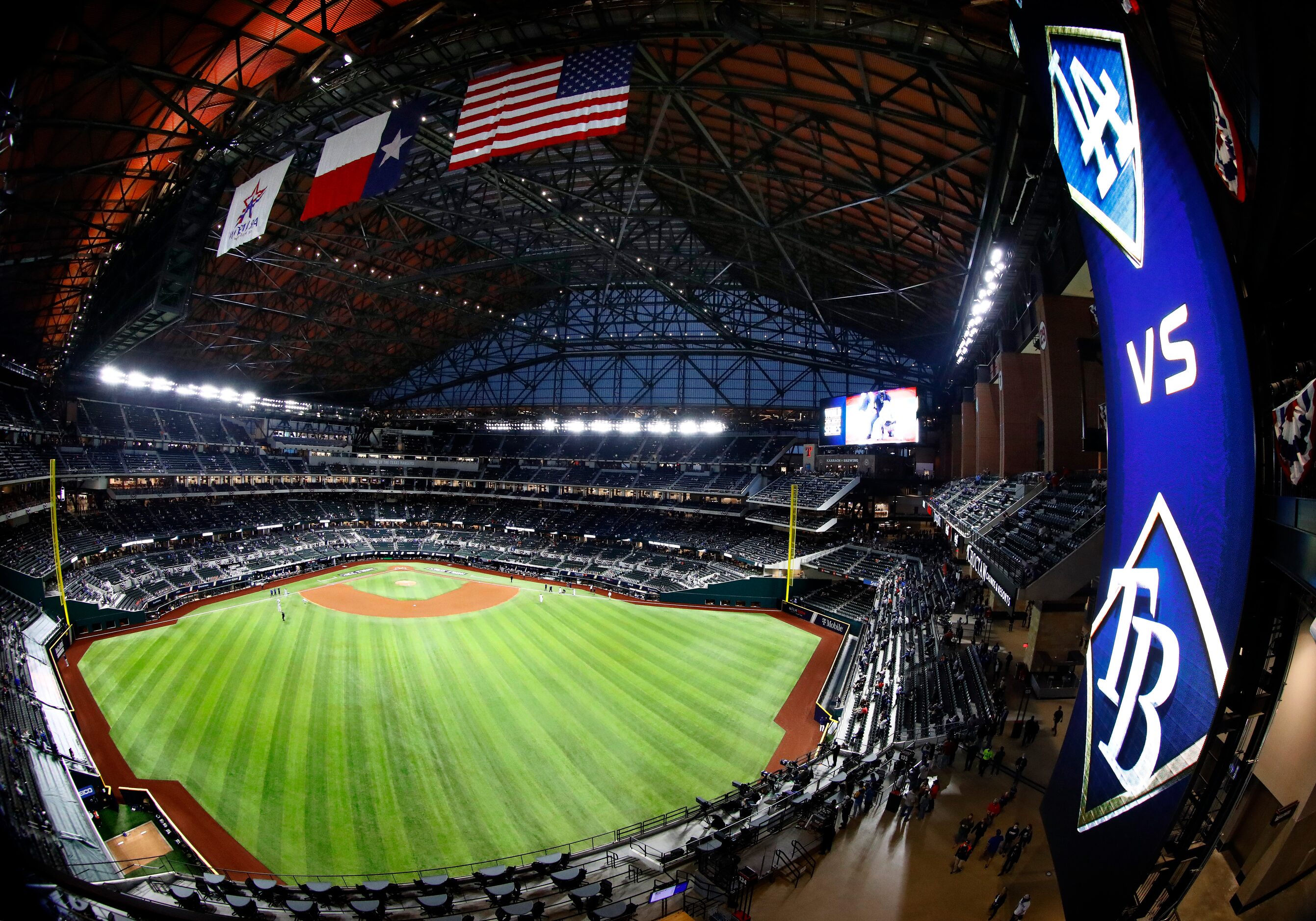 As seen through a fisheye lens, the national anthem is played prior to Game 3 of the World...