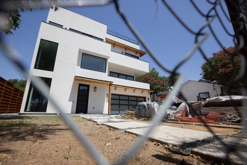 A multistory, new-build home on Coronet Boulevard in West Dallas is under construction on...