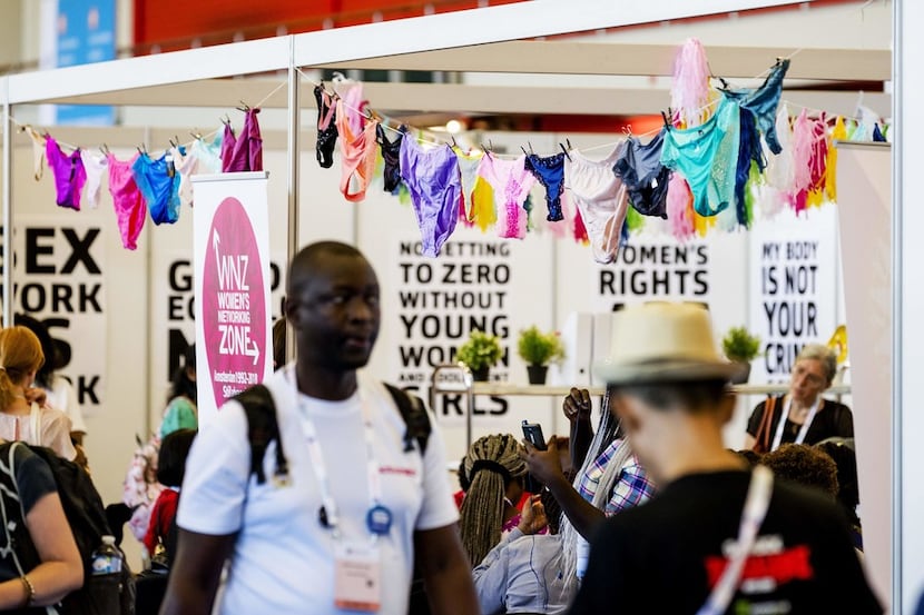 Visitors walked past exhibits during an AIDS conference this week at the RAI Convention...