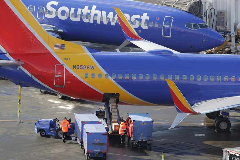 Southwest Airlines planes are loaded Tuesday, Feb. 5, 2019, at Seattle-Tacoma International...
