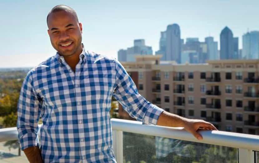 
Javier Moreno, on the roof of his Uptown apartment building, describes his new home city as...