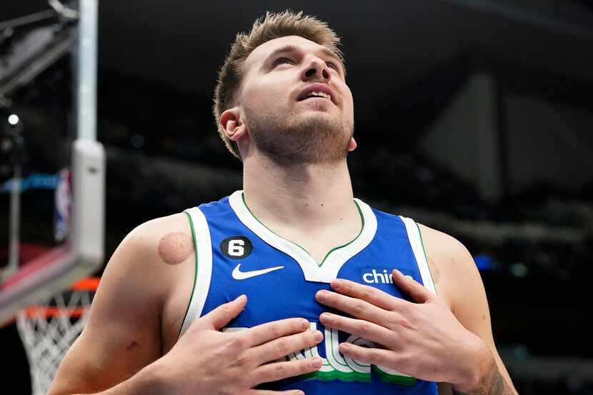Dallas Mavericks guard Luka Doncic reacts to call during the first quarter of an NBA...