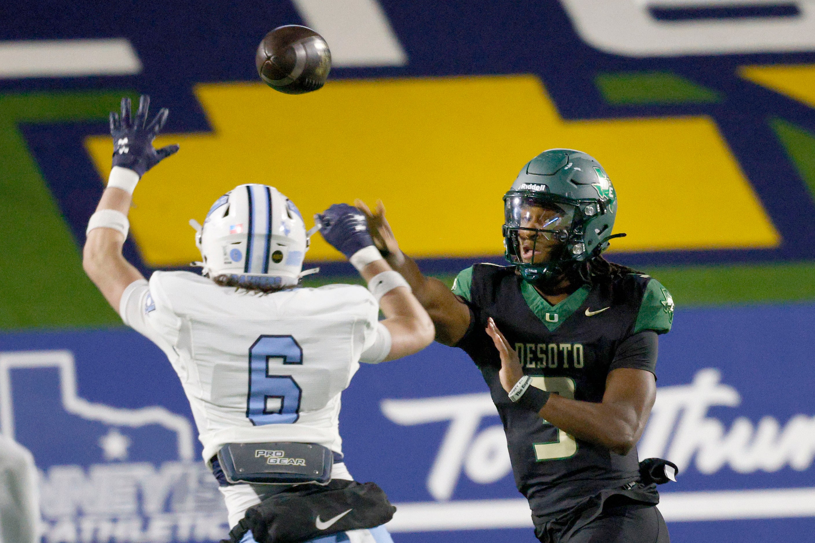 DeSoto's quarterback Kelden Ryan (3) passes under pressure from Wylie East's Noah Janshego...