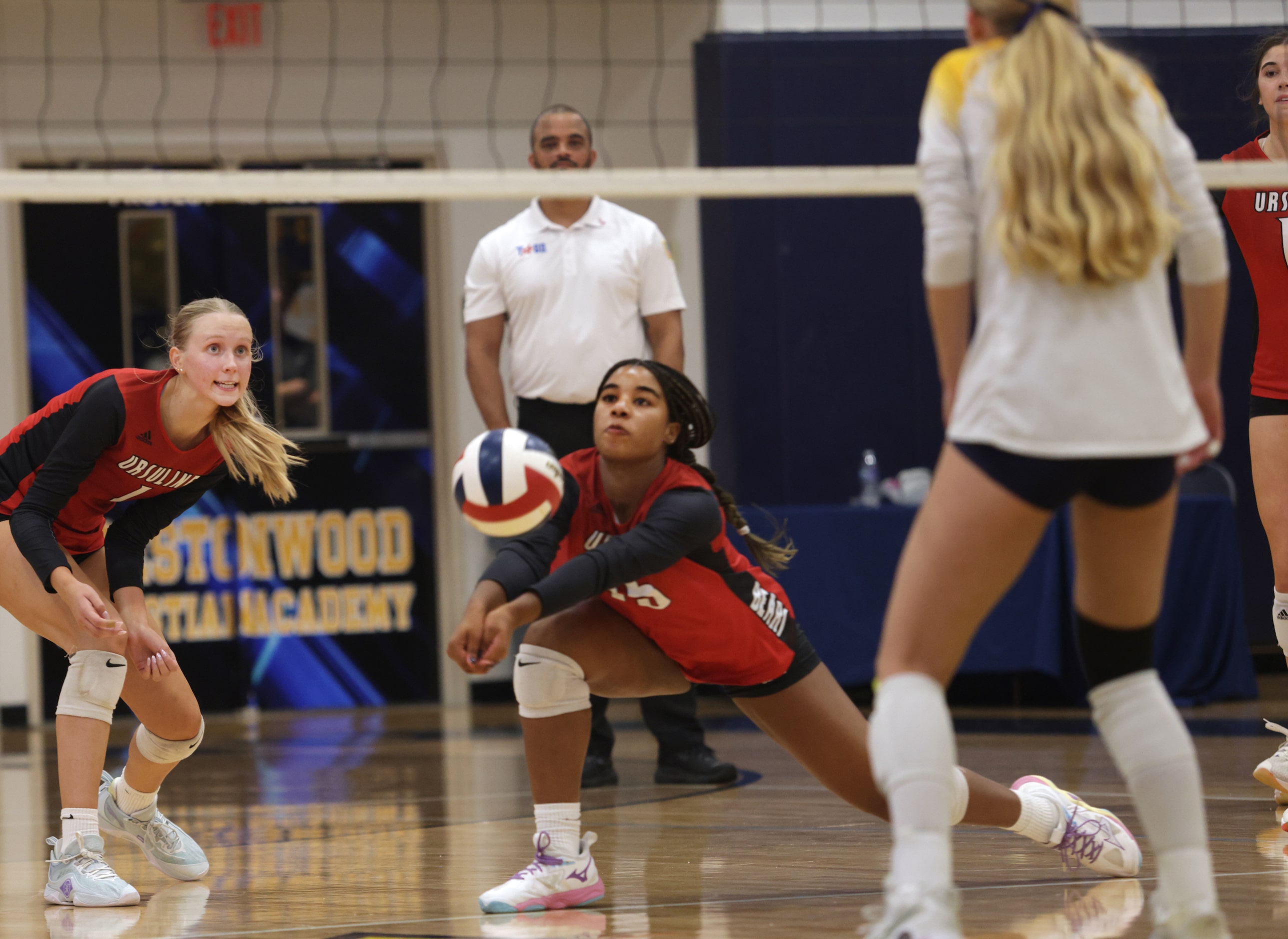 Ursuline player #15 Cali Simmons dives for the ball during the Ursuline Academy of Dallas...