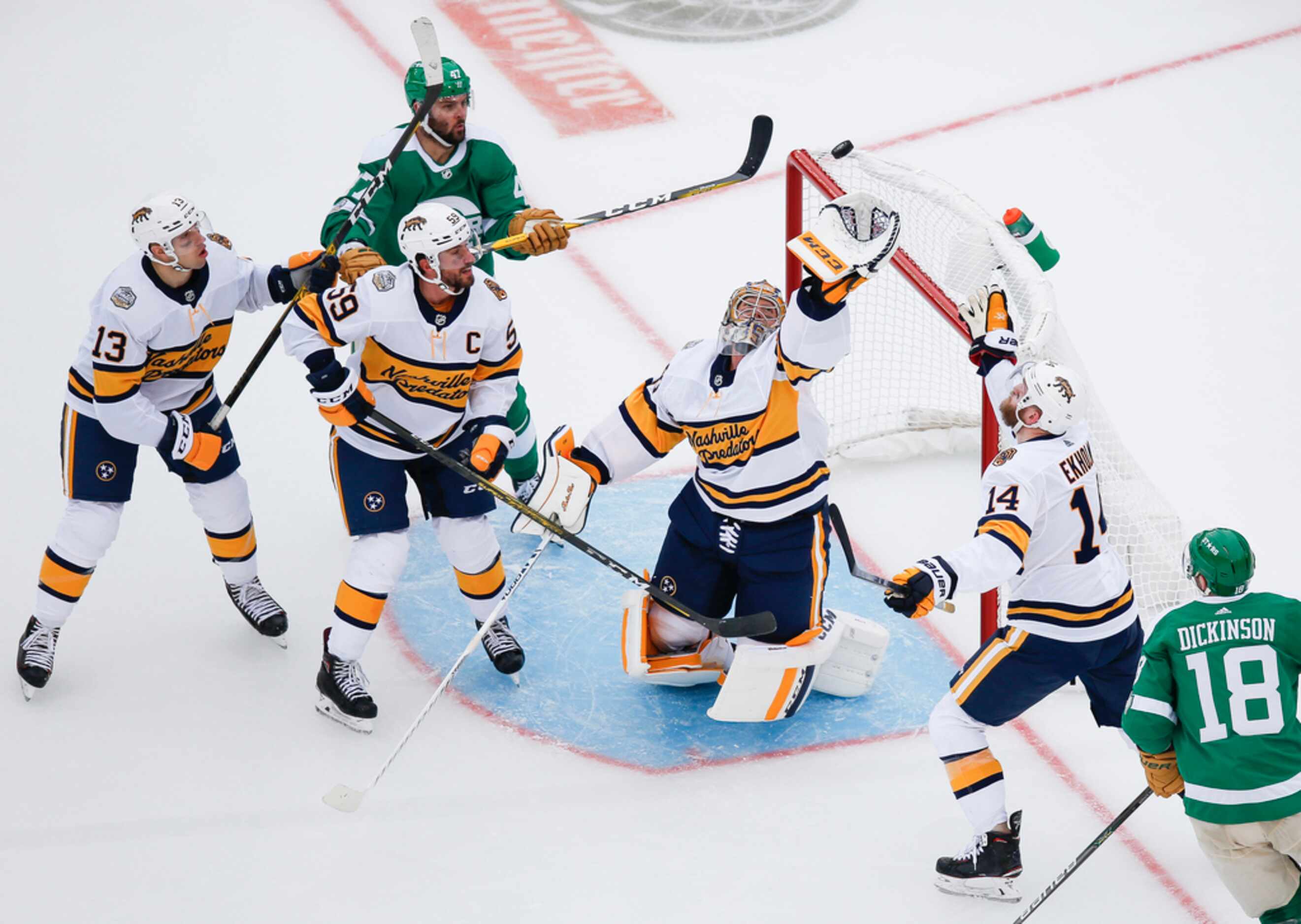 Nashville Predators goaltender Pekka Rinne (35) makes a save during the second period of a...