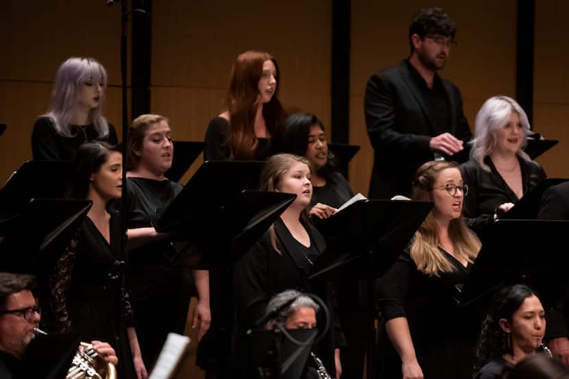 Members of the Highland Park Chorus sing during a performance at Moody Performance Hall in...