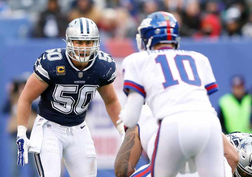 FILE - Dallas Cowboys middle linebacker Sean Lee (50) watches New York Giants quarterback...