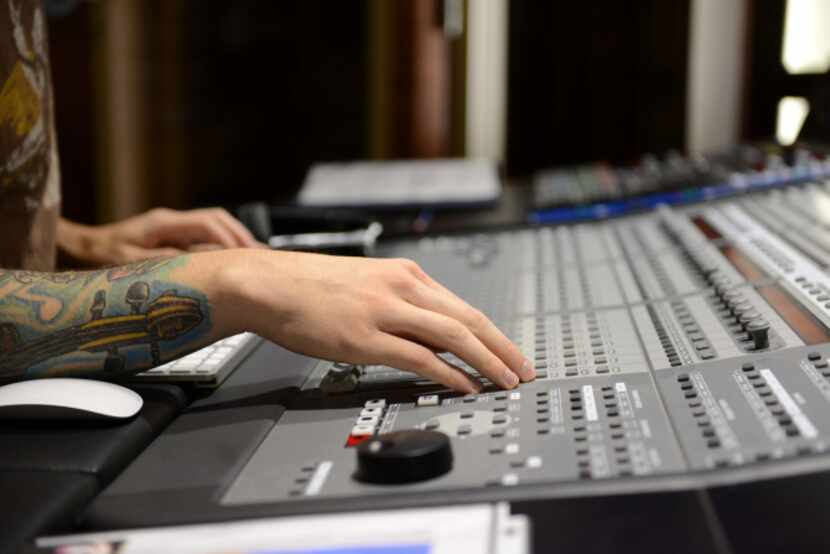 Jay Phipps, recording engineer, works on a track in the studio at the International...