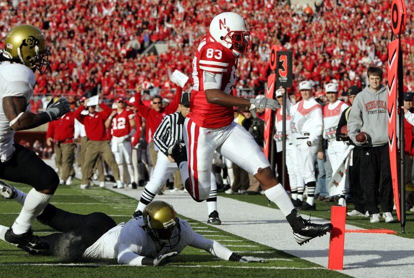 LINCOLN, NE - NOVEMBER 24:  Wide receiver Terrence Nunn #83 of the Nebraska Cornhuskers gets...