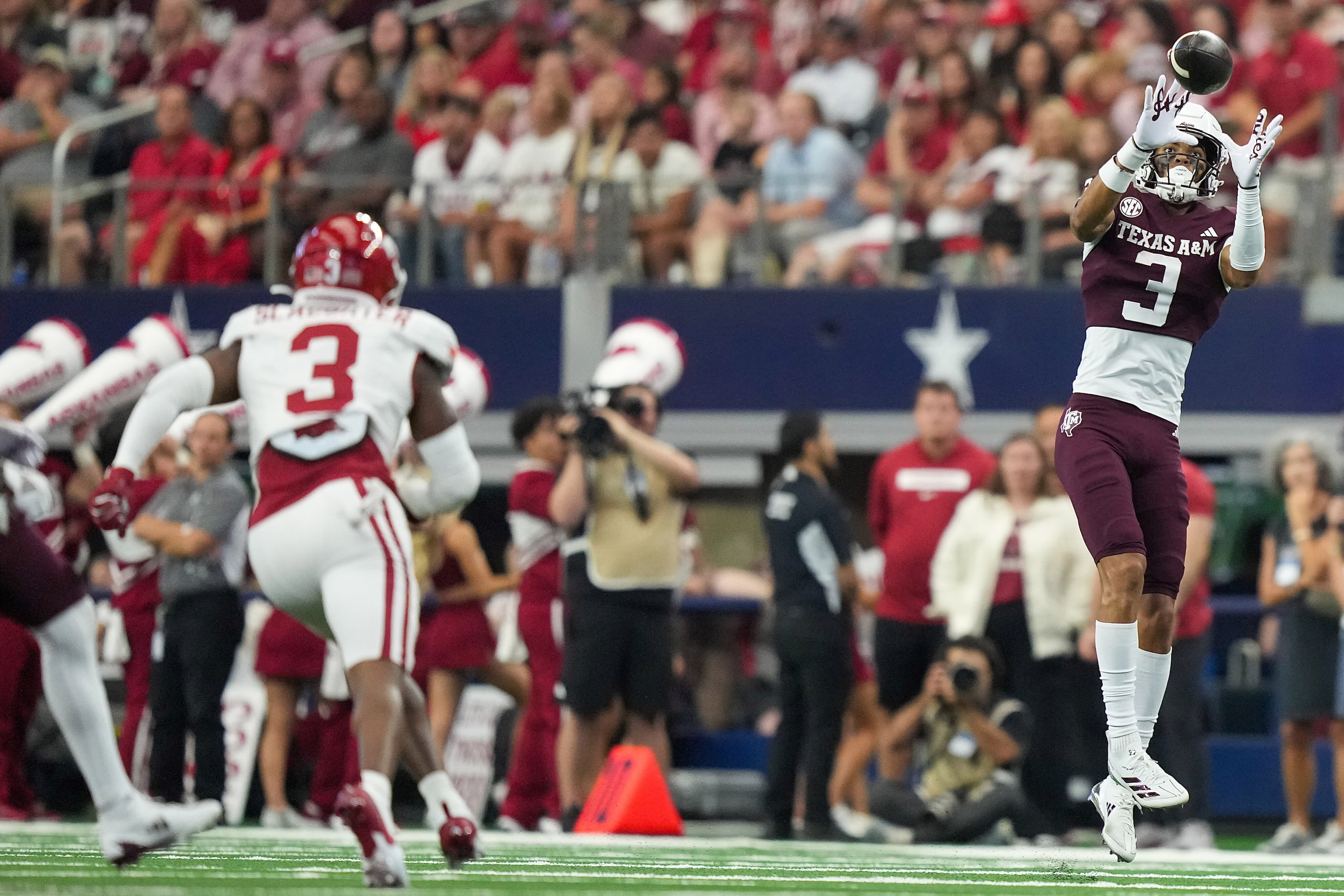 Texas A&M wide receiver Noah Thomas (3) catches a pass on a 42 yard touchdown reception...