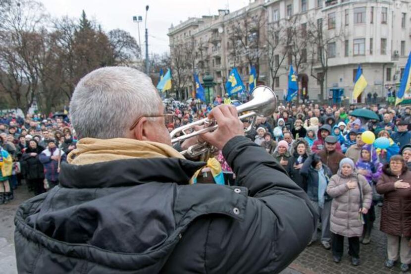 
A man played Ukraine’s national anthem Sunday at a rally in Kharkiv. Russia says Ukraine is...