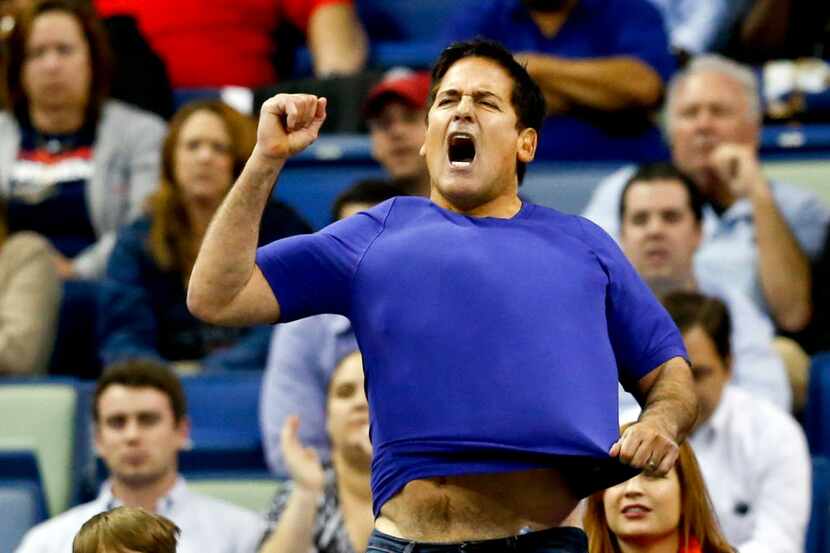 Dec 4, 2013; New Orleans, LA, USA; Dallas Mavericks owner Mark Cuban reacts from the stands...
