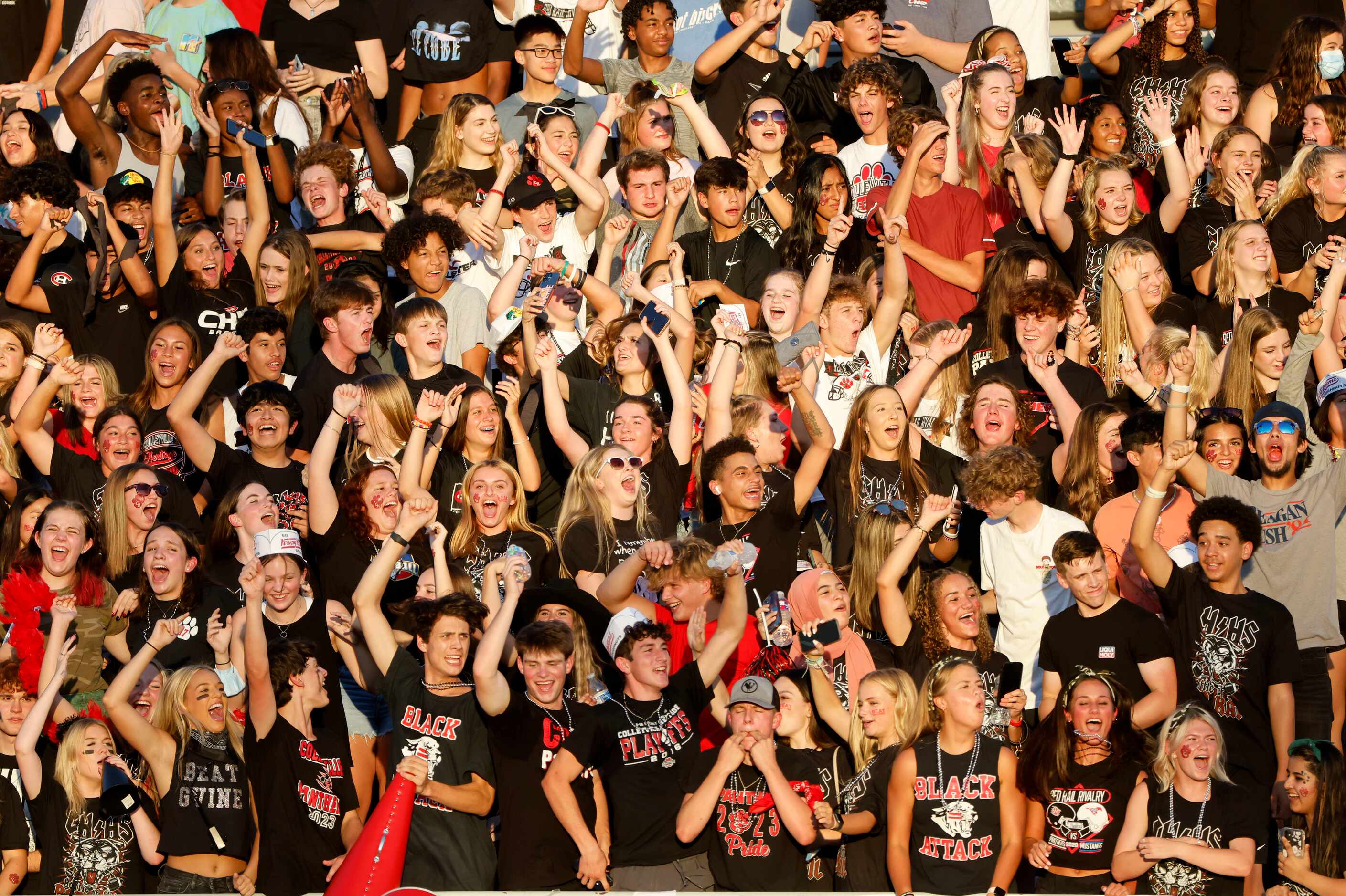 The Colleyville Heritage student section cheers as they played Grapevine during the first...