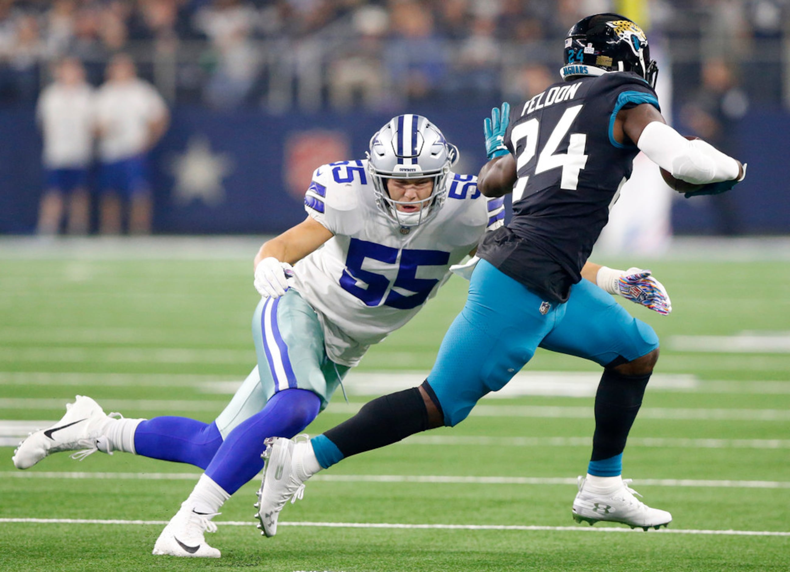 Houston, USA. 30th Aug 2018. August 30, 2018: Dallas Cowboys linebacker  Leighton Vander Esch (55) watches during the 2nd quarter of a preseason NFL  football game between the Houston Texans and the