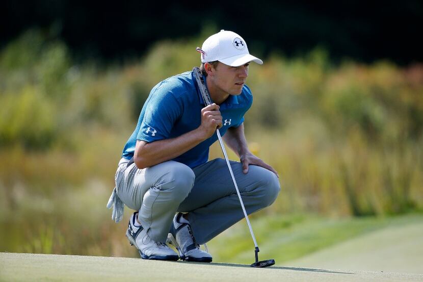 Jordan Spieth lines up a putt on the second hole during the final round of the Dell...