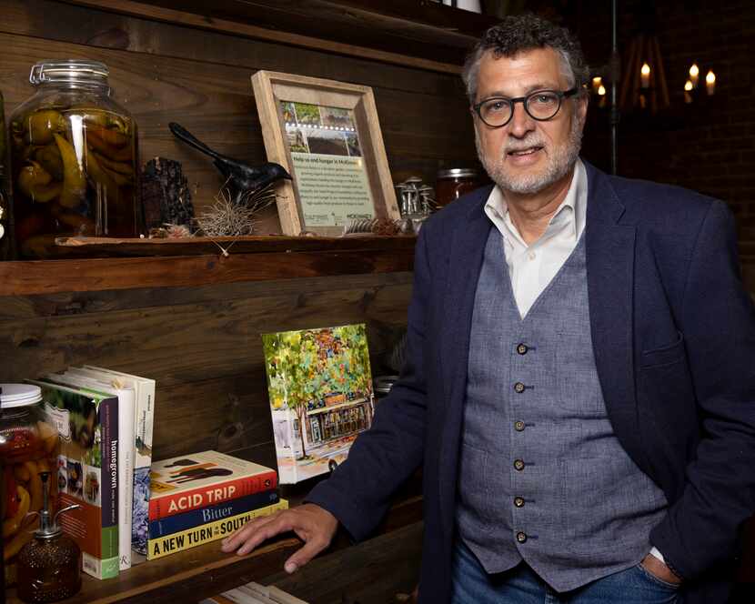 Owner Rick Wells poses for a portrait at Harvest farm-to-table restaurant in Historic...