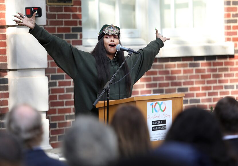 Erykah Badu speaks during the school's 100th Anniversary ceremony at Booker T. Washington...