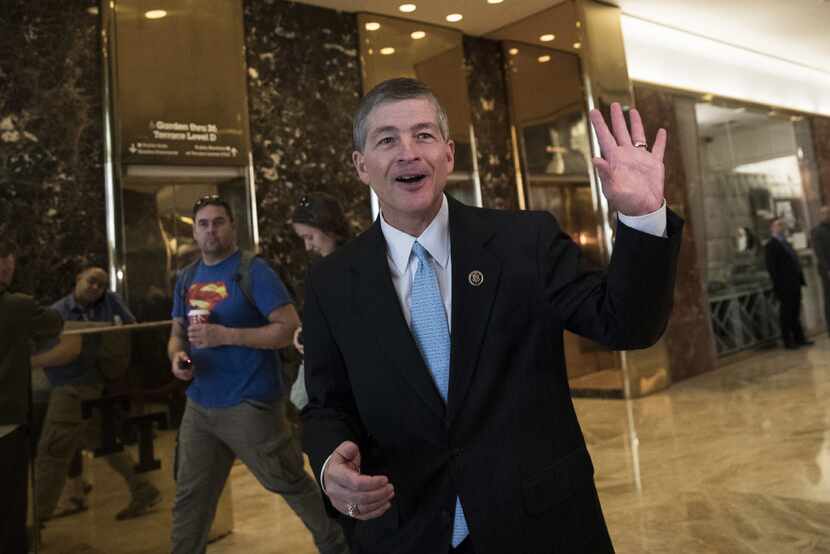 Rep. Jeb Hensarling, chairman of the House Financial Services Committee, waved after...