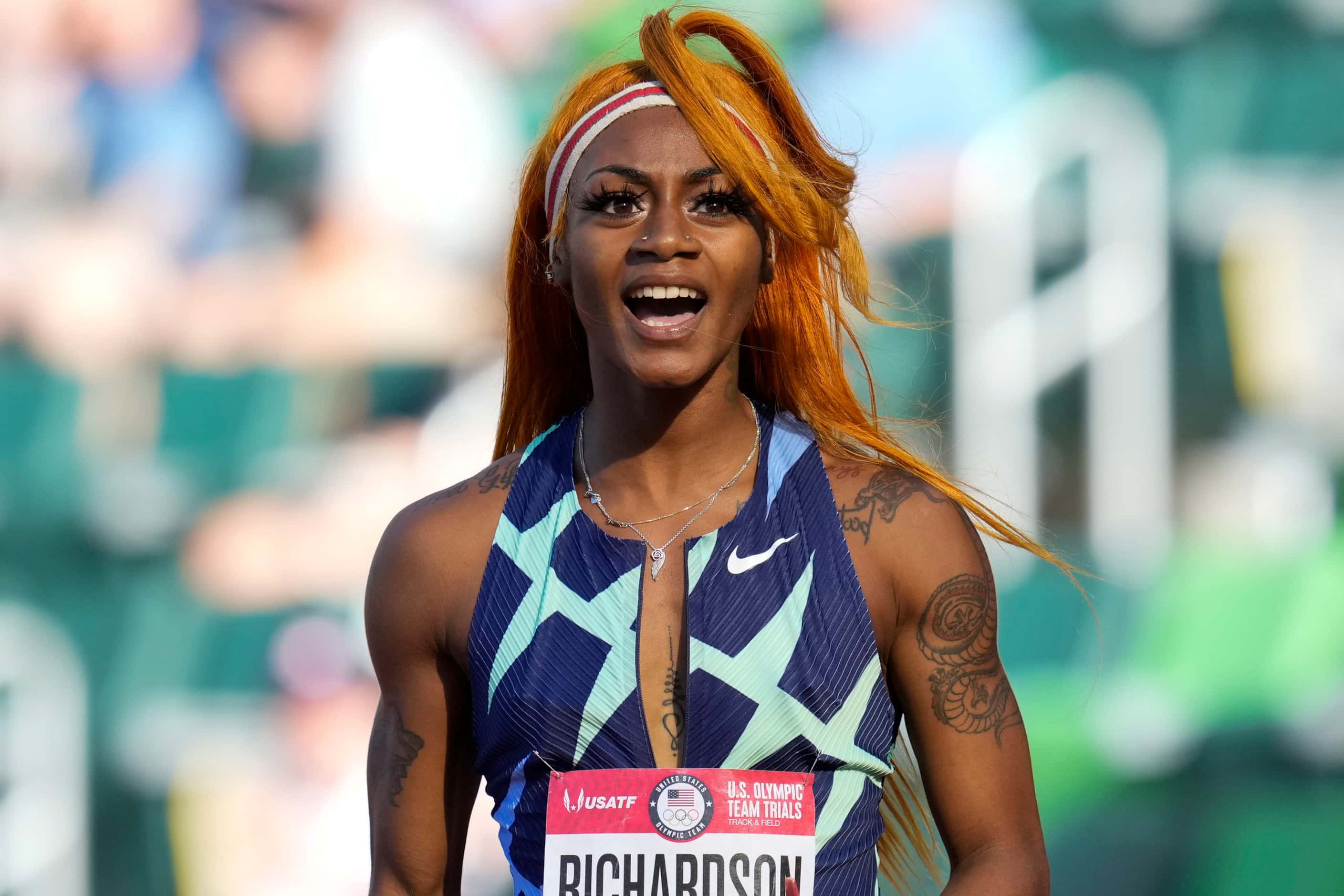 In this June 19, 2021, photo, Sha'Carri Richardson celebrates after winning the first heat...