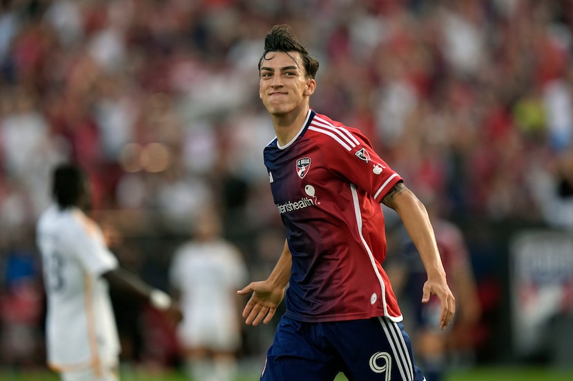 FC Dallas forward Petar Musa reacts after scoring during the first half of an MLS soccer...