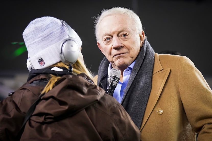Dallas Cowboys owner and general manager Jerry Jones is interviewed by Cowboys sideline...