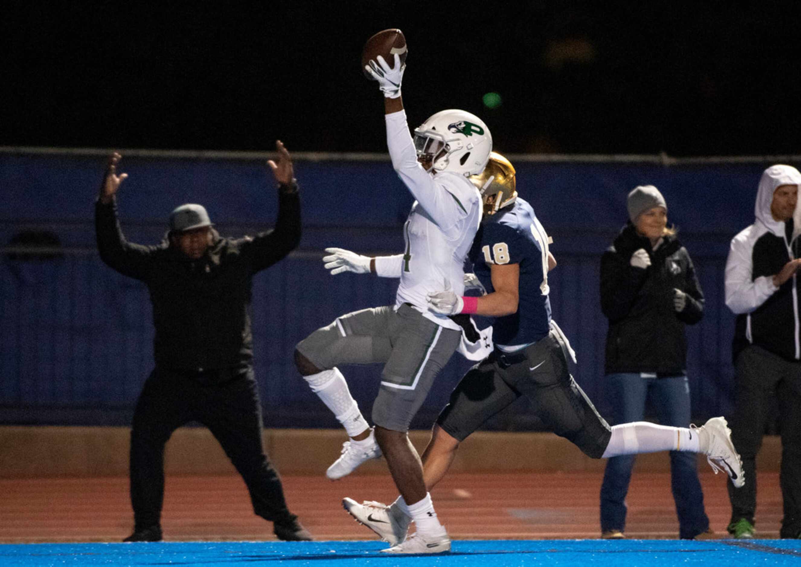 Prosper sophomore wide receiver Tyler Bailey (4) celebrates a touchdown reception in front...